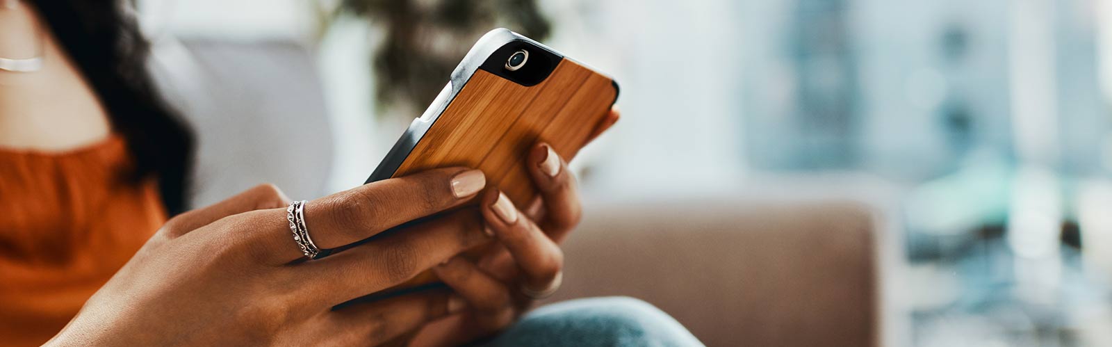 a person holding their mobile device